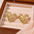 Wholesale  retro sweet cool stainless steel peach heart earrings