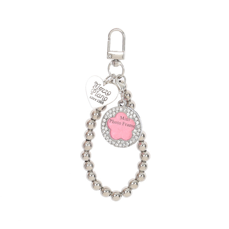 Wholesale Diamond-inlaid five-pointed star tag metal texture dog bone keychain