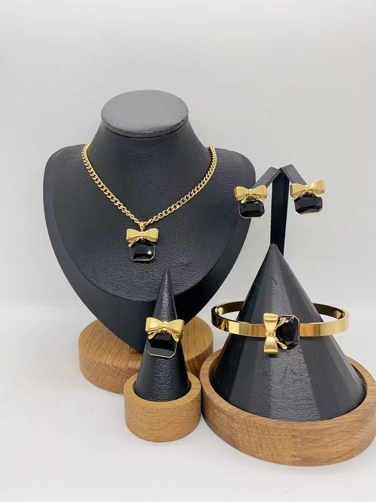 Wholesale Stainless Steel Bow Rhinestone Necklace,  Bracelet,  Earrings,  and Ring Set