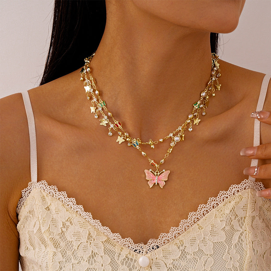 Wholesale Diamond-encrusted round pearl butterfly necklace