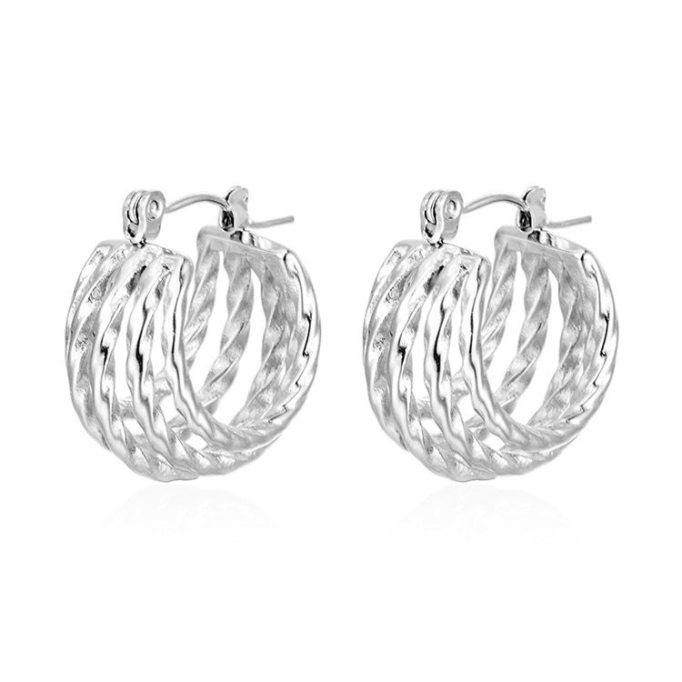 Wholesale temperament stitching twisted titanium steel earrings