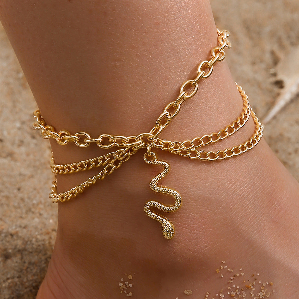 Wholesale Alloy Golden Cross Tassel Snake Pendant Three Layer Anklet for Women