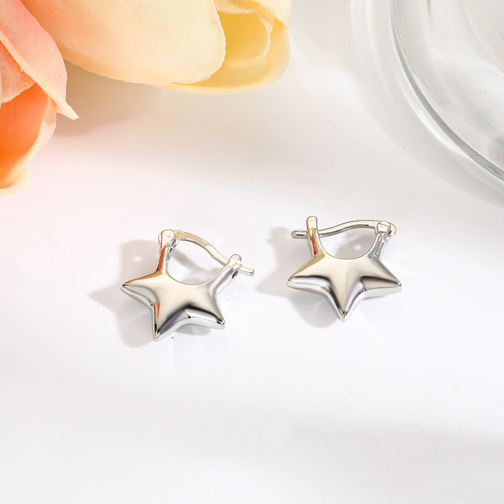Wholesale glossy hollow star earrings