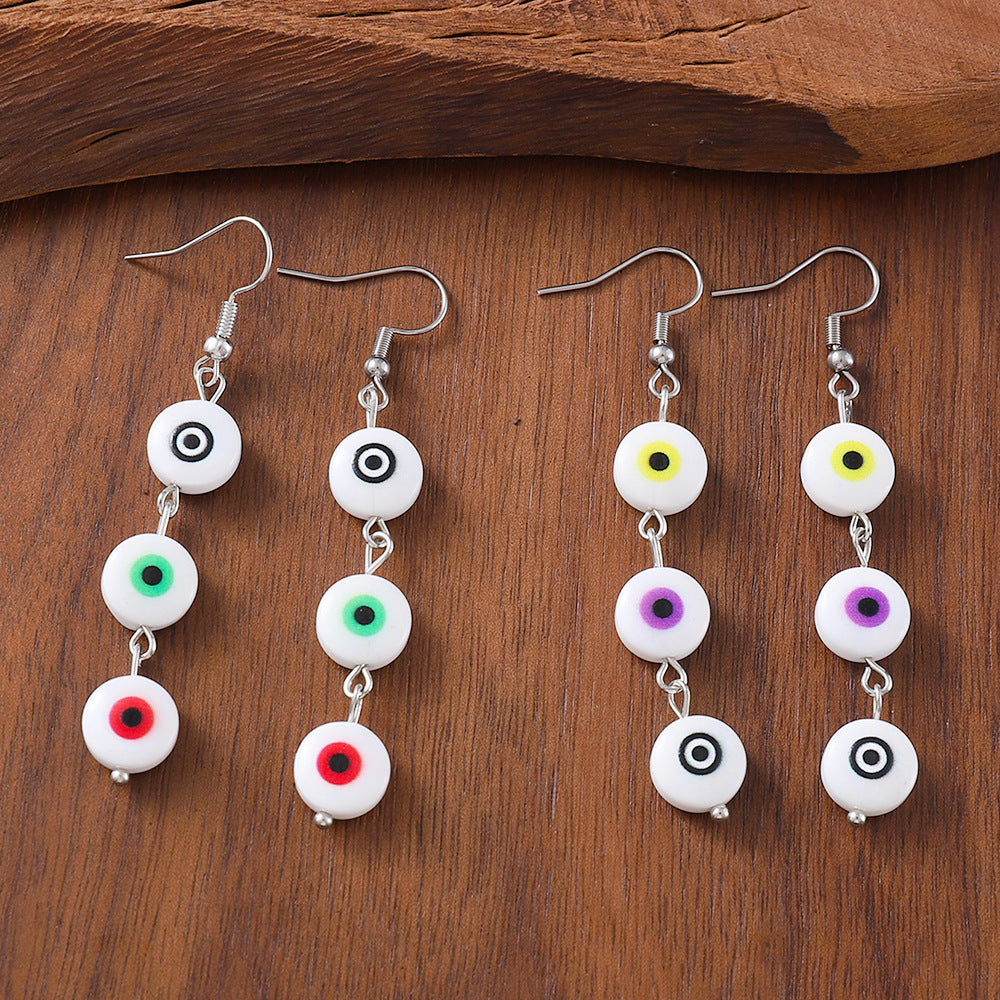 Wholesale devil's eye tassel earrings