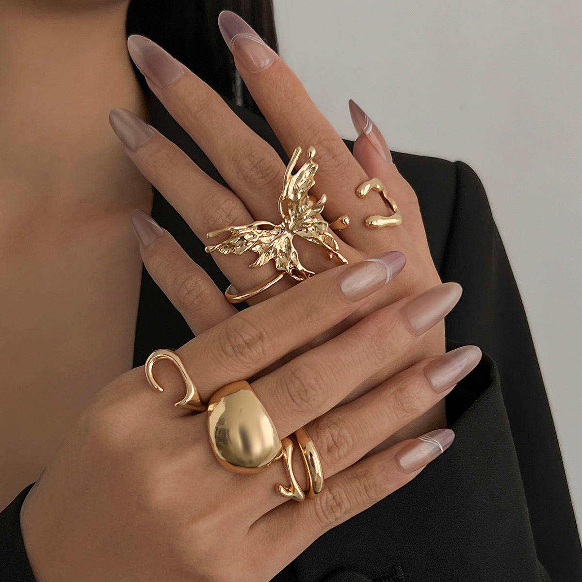 Wholesale Butterfly smooth liquid irregular alloy ring set
