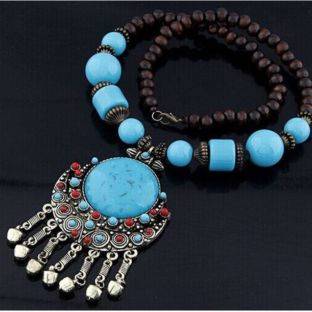 Wholesale Bohemian Turquoise Bell Pendant Long Necklace Alloy Fashion Boutique Resale