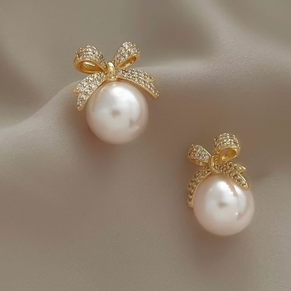 Wholesale Zirconia Bow Pearl Ear Clip Earrings
