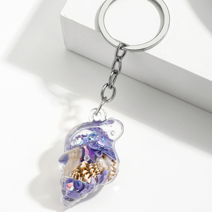 Wholesale Trendy Blue Acrylic Sea Shell Flowing Sand Keychain Charm Fashion Bag Decoration Creative Gift For Any Ocn