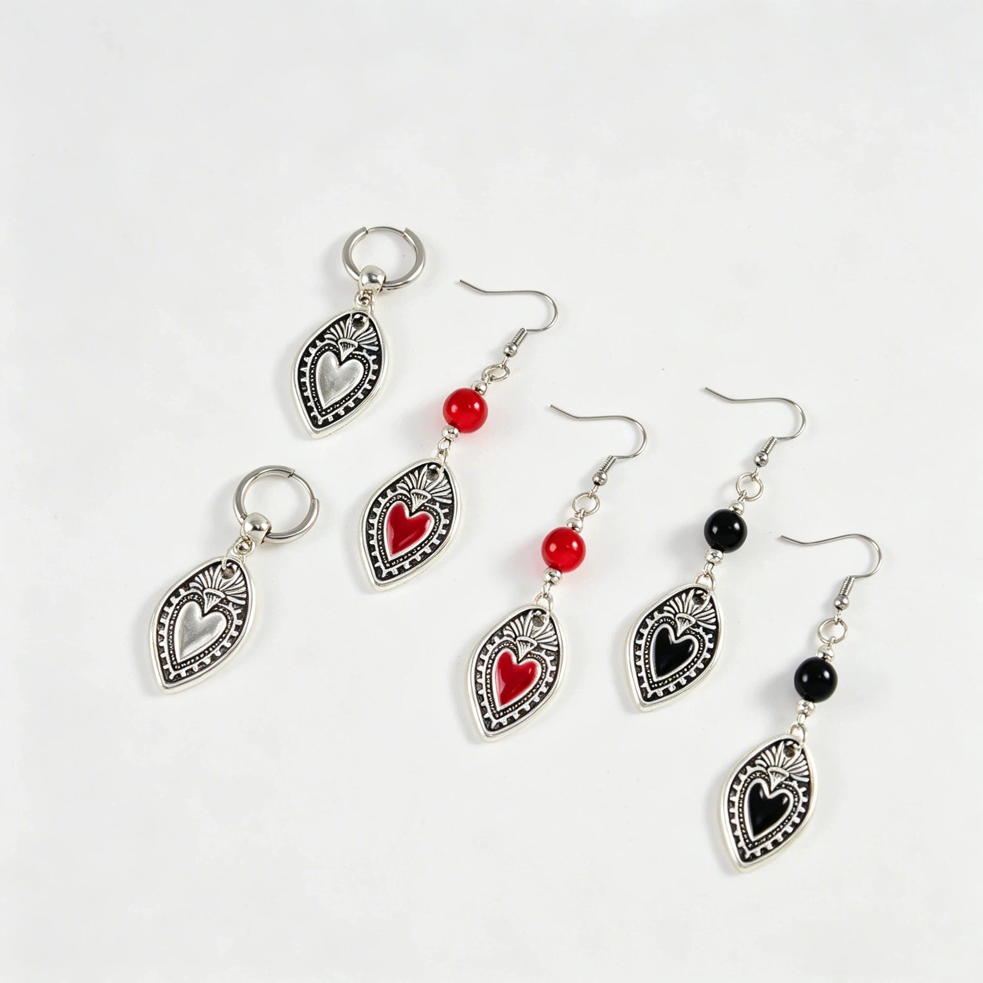 Wholesale Cross-border European and American style retro shield and heart earrings for women,  high-end alloy heart ear clips,  vintage style niche design