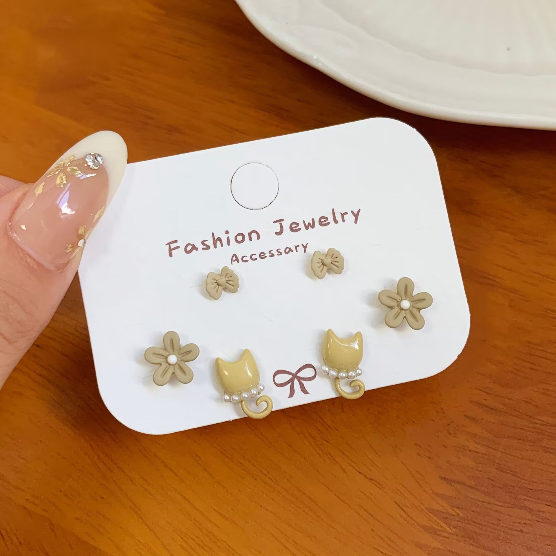 Wholesale Autumn cat geometric bean earrings set silver needle simple small flower bow earrings