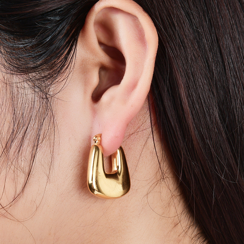 Wholesale titanium steel stereo 14K gold hollow metal geometric U-shaped earrings