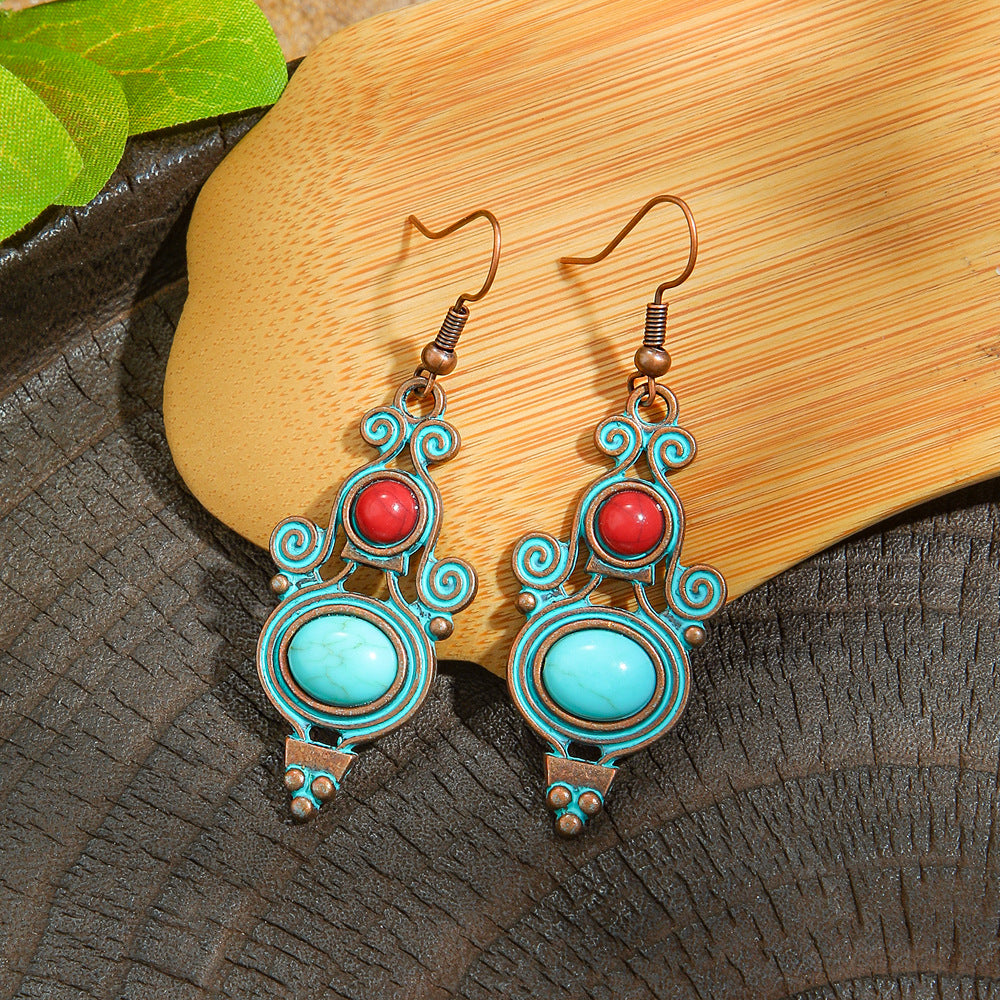 Wholesale Retro Bohemian Turquoise Heart Hollow Leaves Alloy Earrings for Party Wear Boutique Resale Jewelry