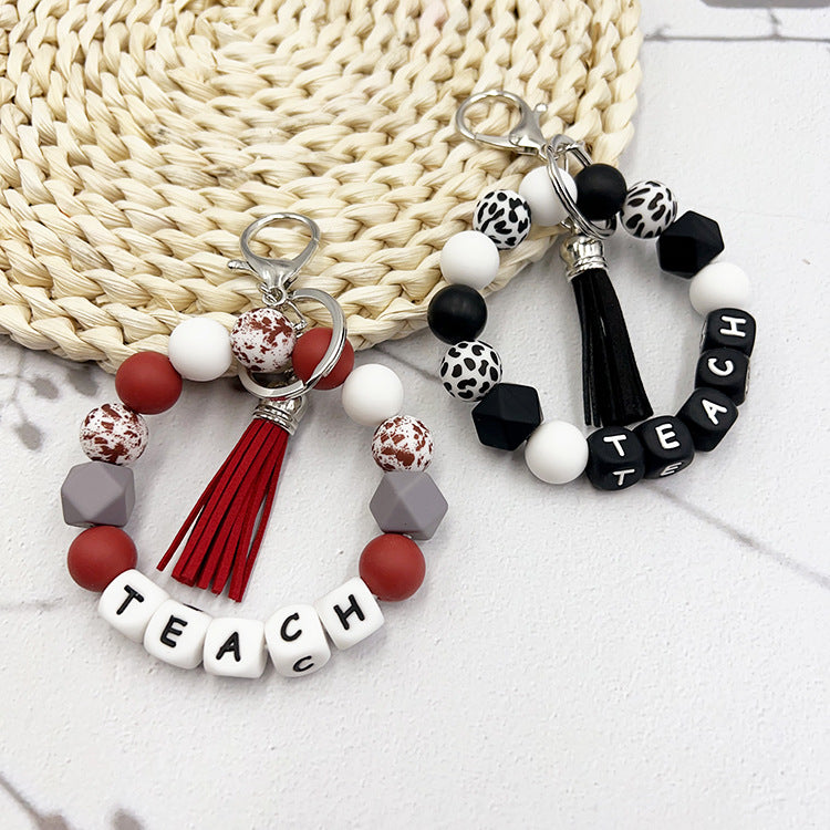 Wholesale Black And White Alphabet Bead Tassel Keychain Bag Charm For Teacher S Day Gift