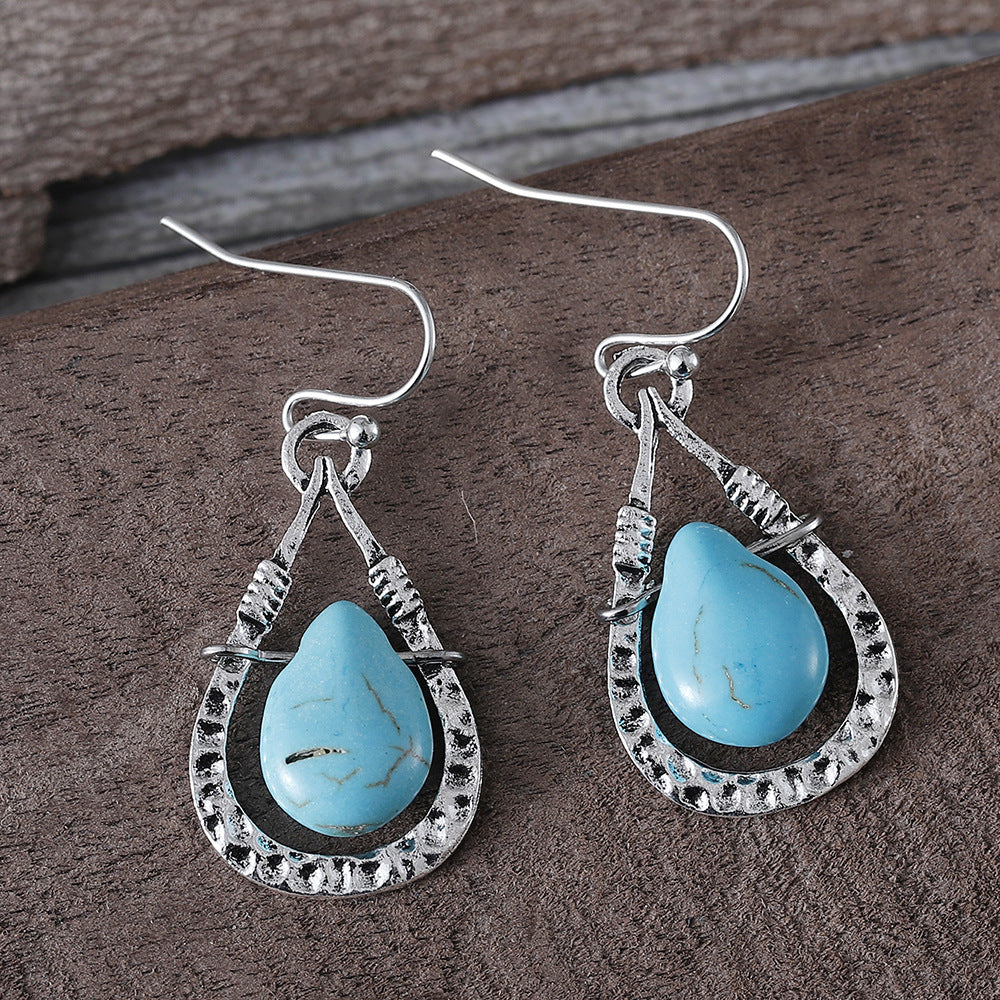 Wholesale Electroplated Zinc Alloy Hollow Turquoise Drop Earrings Bohemian Party Wear