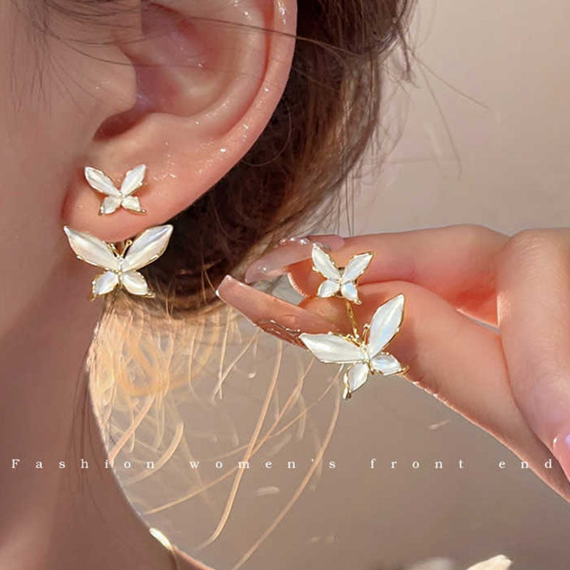 Wholesale 2026 Collection: Women' s Micro-Pavé Zircon Bowknot Earrings — S925 Silver Posts,  Niche-Style High-End Pearl Studs