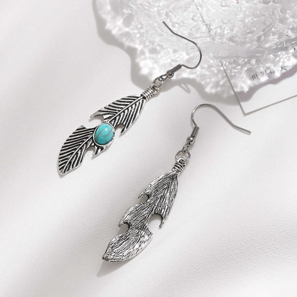 Wholesale  handmade fashion personality feather inlaid turquoise earrings