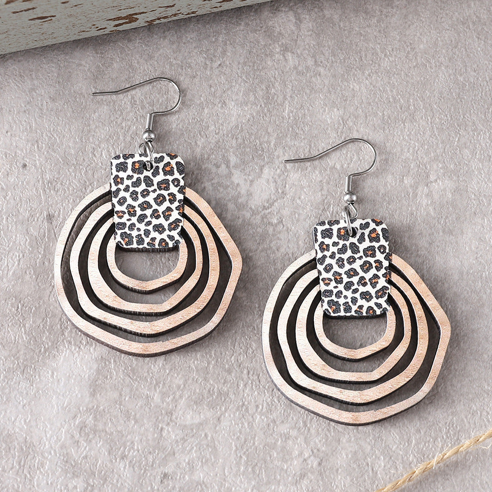 Wholesale Bohemian style three-dimensional leopard gradient hollow pendant earrings