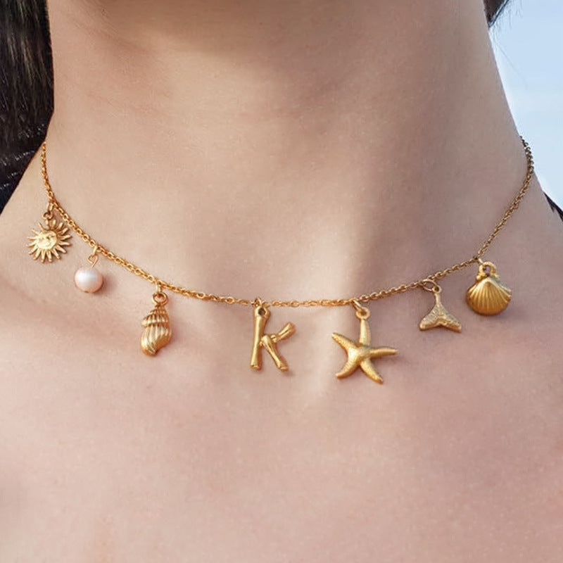 Wholesale Bohemian Shell Starfish Gold Electroplated Copper Alphabet Pendant Necklace for Women Fashion Accessory