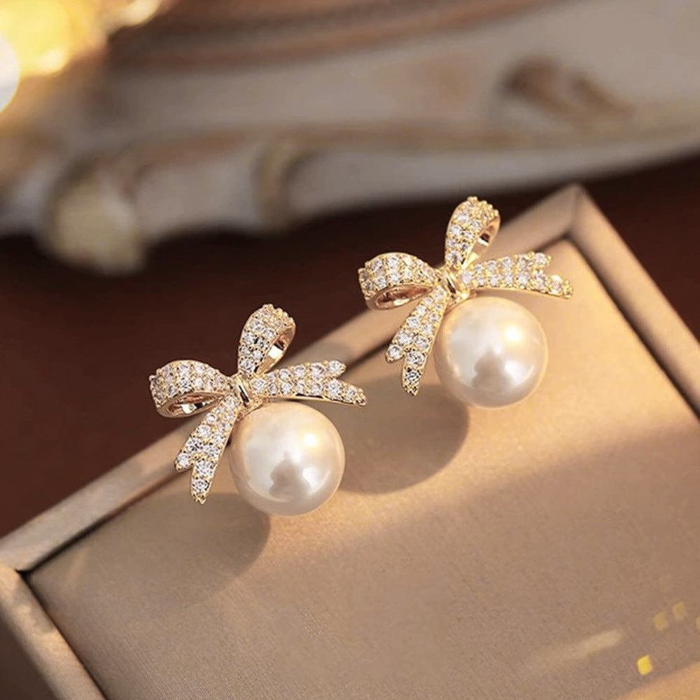 Wholesale Zirconia Bow Pearl Ear Clip Earrings