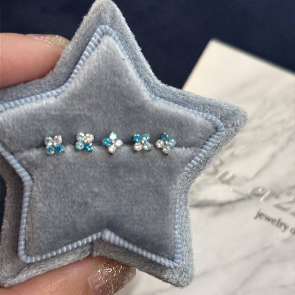 Wholesale Gradient Blue White Zircon Mini Four-leaf Clover Ear Bone Nail Titanium Steel Screw Earring