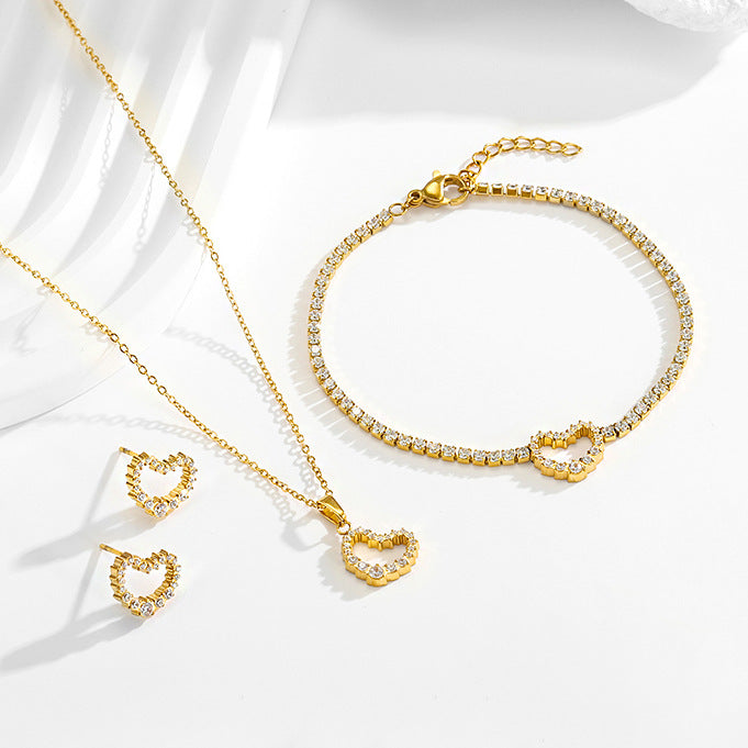 Wholesale Titanium steel heart-shaped necklace earrings and bracelet set inlaid with zircon.