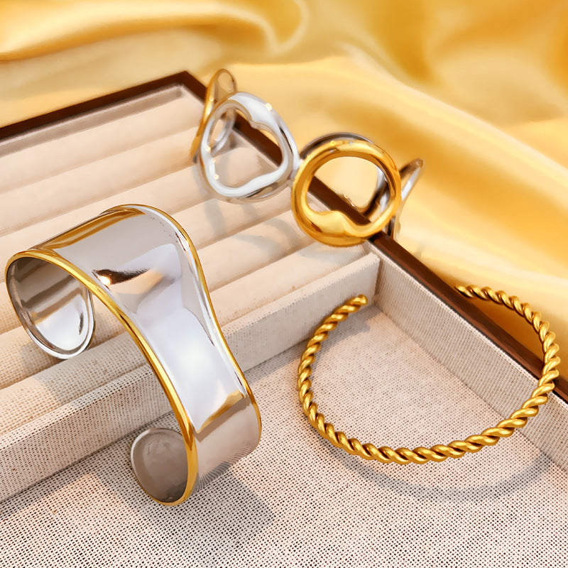 Wholesale Stainless Steel Bangle with 18K Metallic Finish and Two-Tone Gold Open Design