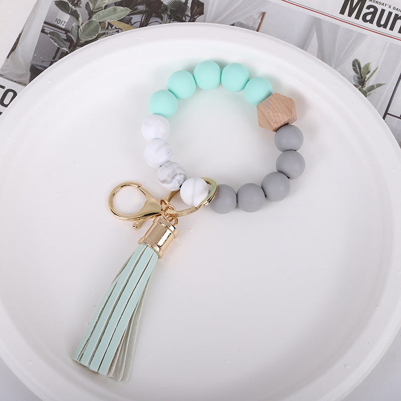 Wholesale Trendy Silicone Bead Bracelet With Tassel Wooden Bead Keychain Natural Geometry Style Chic Jewelry Accessory Gift