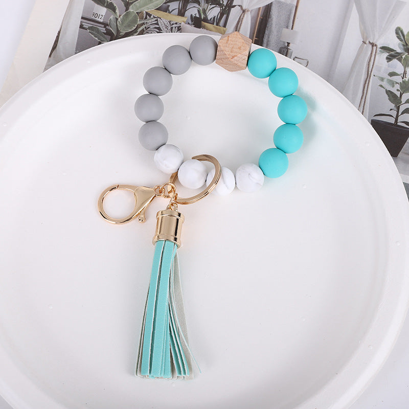 Wholesale Trendy Silicone Bead Bracelet With Tassel Wooden Bead Keychain Natural Geometry Style Chic Jewelry Accessory Gift