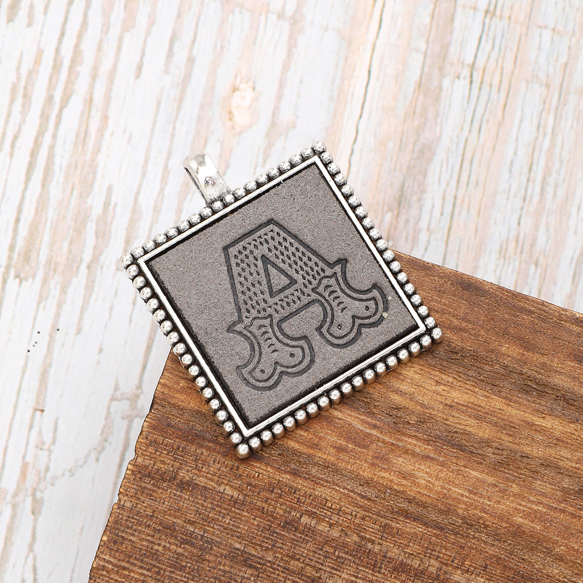 Wholesale  Electroplated Alloy Leather Printed Pattern 26 Letter Pendant  Keychain