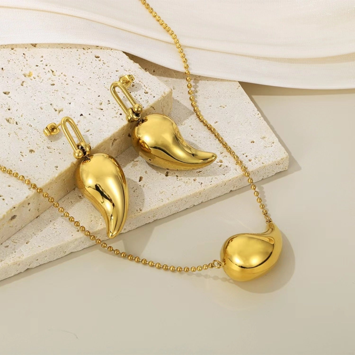 Wholesale High-end design chubby water drop earrings  stainless steel hollow earrings