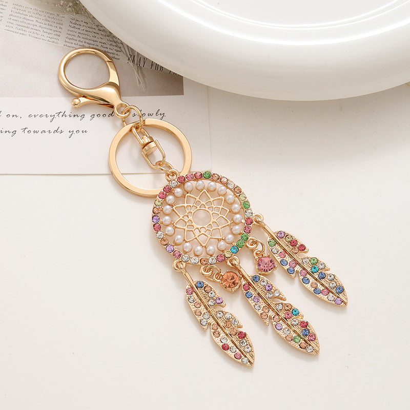 Wholesale New Palace Style Creative Diamond-encrusted Hollow Dreamcatcher Feather Keychain Car Bag Pendant Metal Small Gift