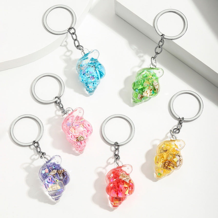 Wholesale Trendy Blue Acrylic Sea Shell Flowing Sand Keychain Charm Fashion Bag Decoration Creative Gift For Any Ocn