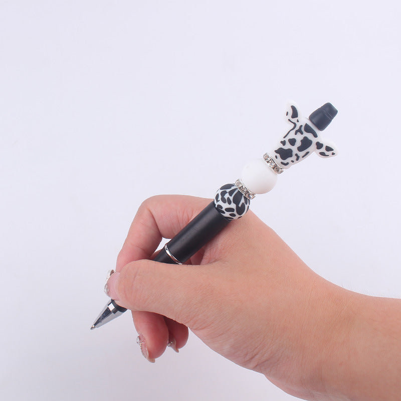 Wholesale creative cartoon cow head pattern silicone beaded pen  ballpoint gel pen