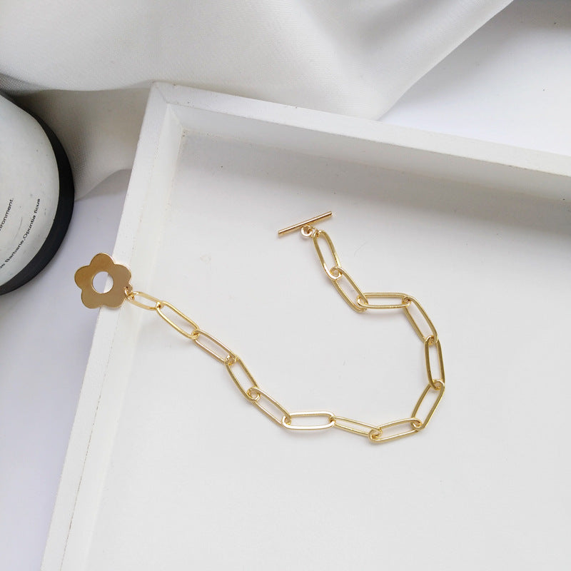 Wholesale Women' s Titanium Steel Bracelet with OT Clasp and Floral Charm — 18K Gold Plated