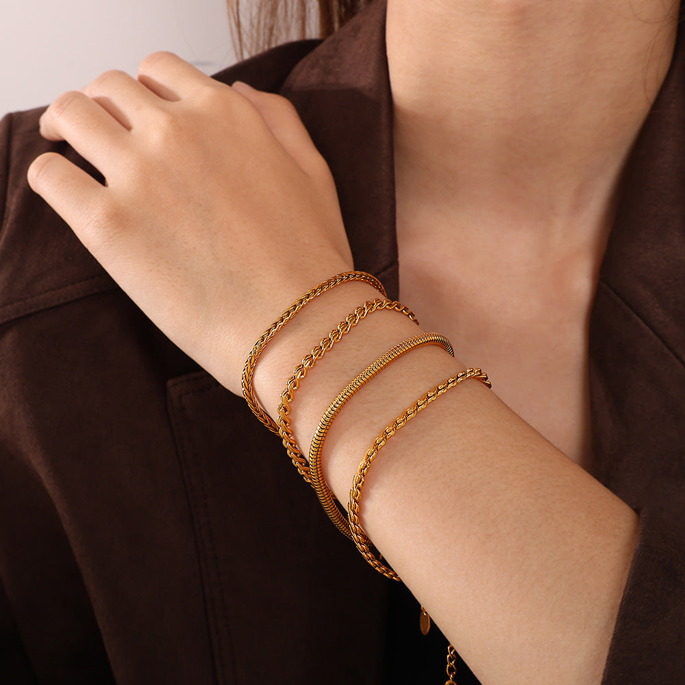 Wholesale Retro Accessible Luxury Stainless Steel 18K Texture Niche High-End Twist Snake Bone Wave Texture Shape Design Bracelet