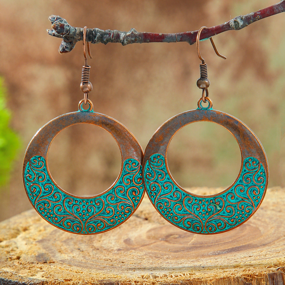 Wholesale Retro Bohemian Turquoise Heart Hollow Leaves Alloy Earrings for Party Wear Boutique Resale Jewelry