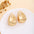Wholesale Retro Flower Pearl Hollow Love Light Luxury Earrings