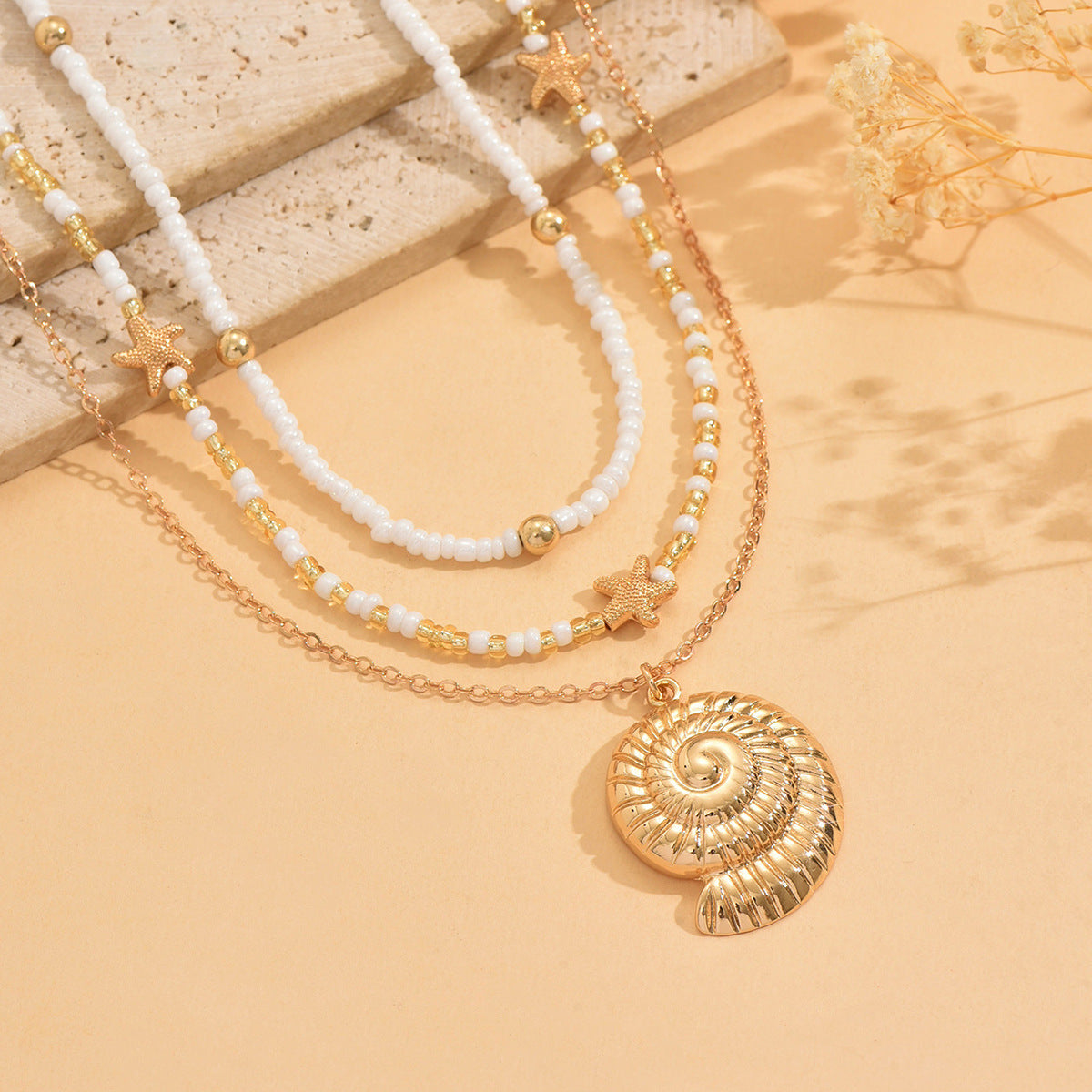 Wholesale starfish and conch pendant necklace