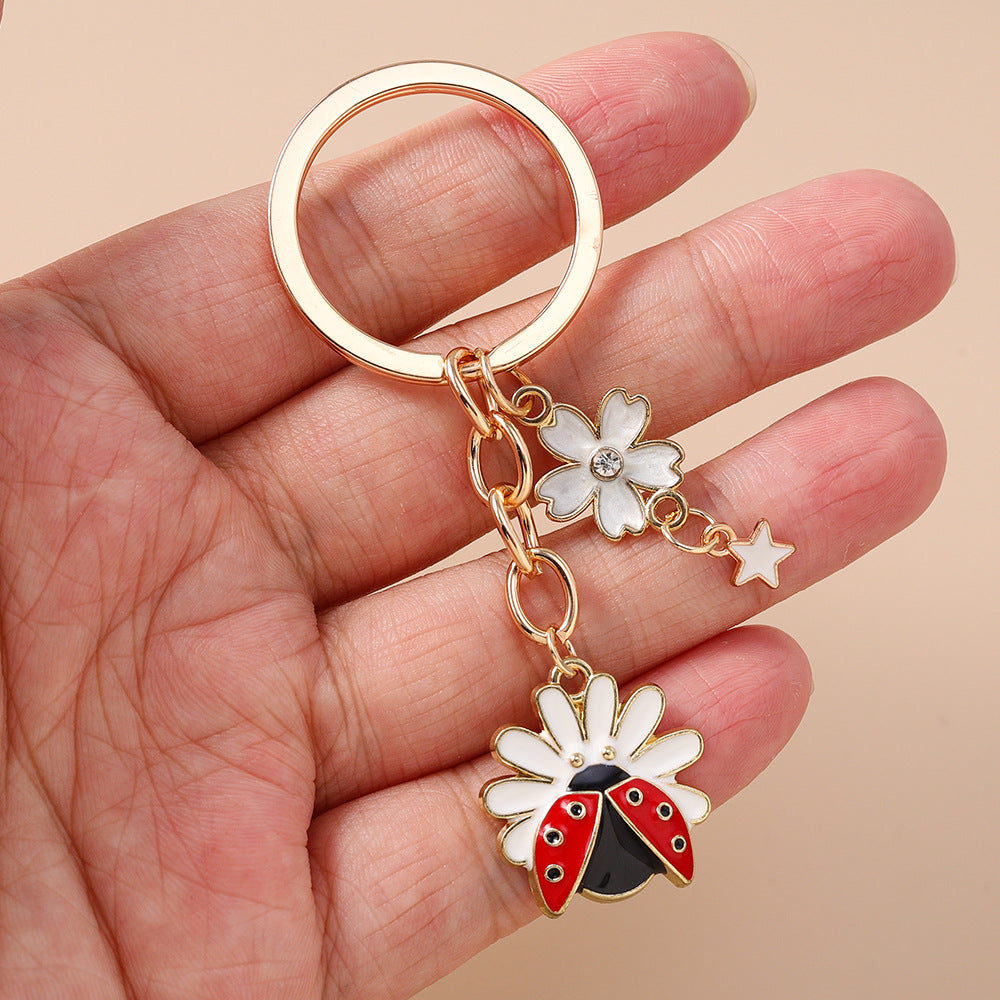 Wholesale Alloy animal and flower keychain