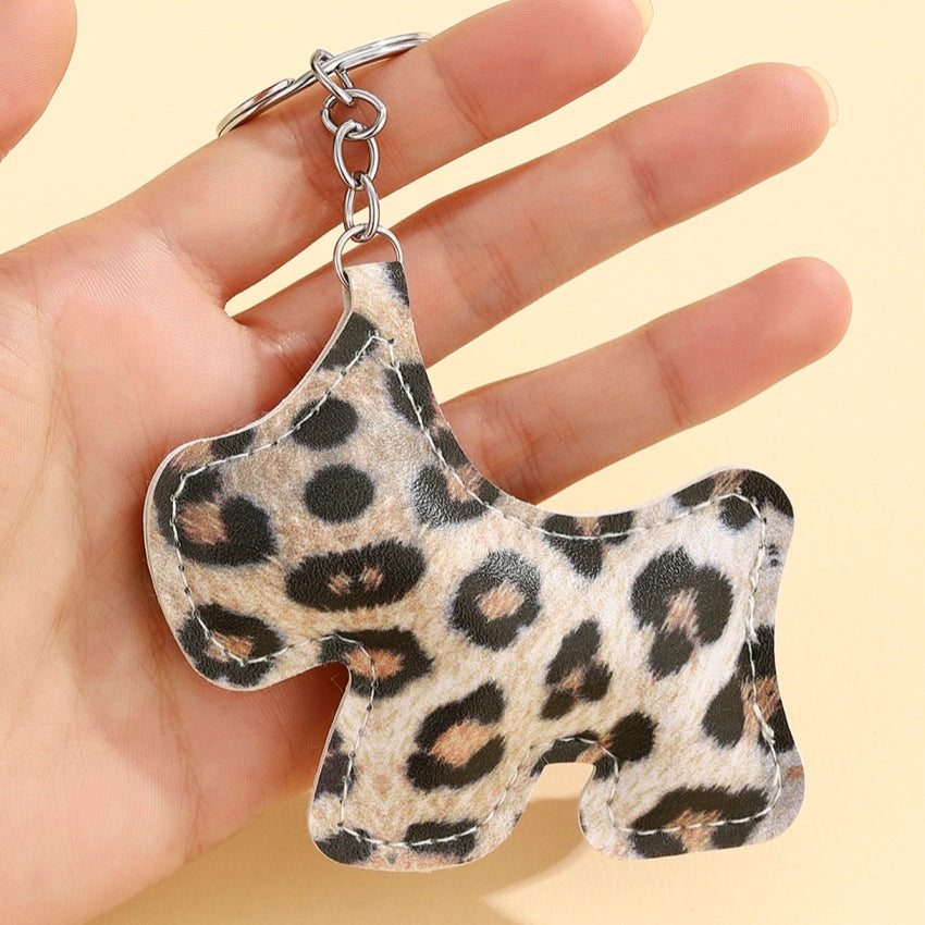 Wholesale New keychain pendant PU cotton-filled leopard print puppy car pendant bag pendant new couple heart pendant.