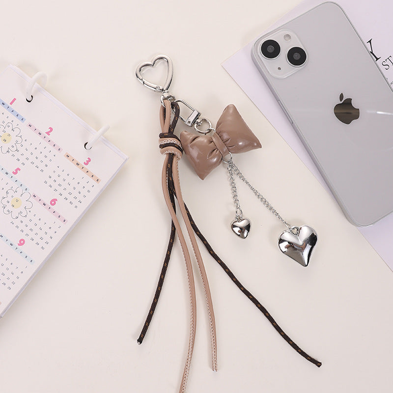 Wholesale Leather cord bow tassel keychain