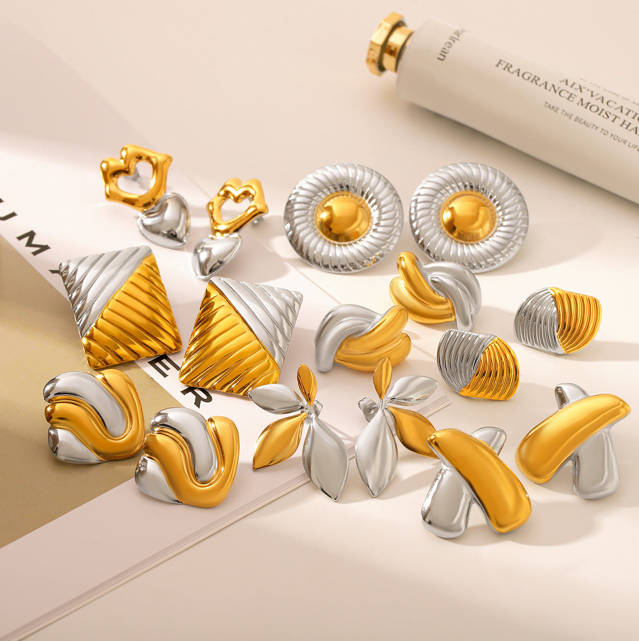 Wholesale Titanium steel earrings gold and silver color matching heart-shaped leaf earrings