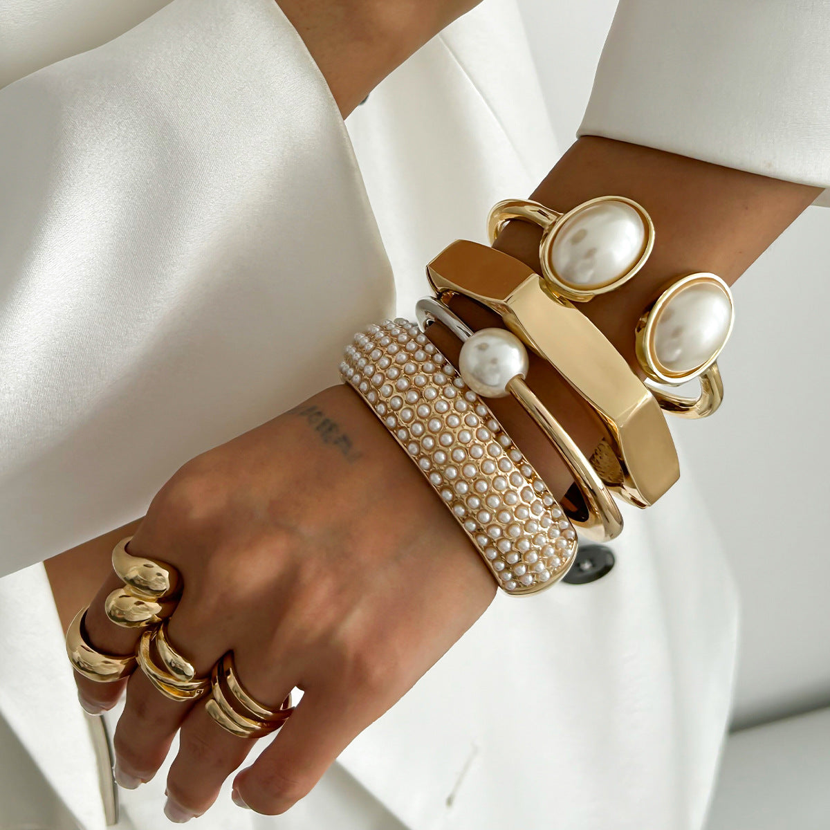 Wholesale Open cut edge elliptical two-color alloy Bracelet set