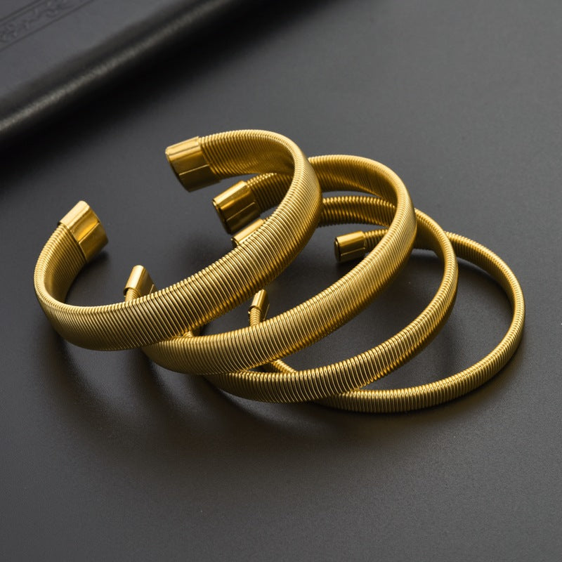 Bracciale aperto semplice all'ingrosso in acciaio inossidabile elastico a forma di C