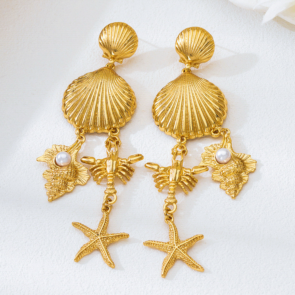 Wholesale Ocean-themed alloy earrings jewelry pendants light luxury and high-end gold color