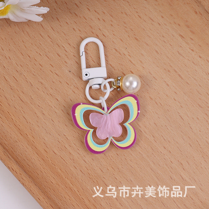 Wholesale Acrylic colorful hollow butterfly pearl pendant keychain