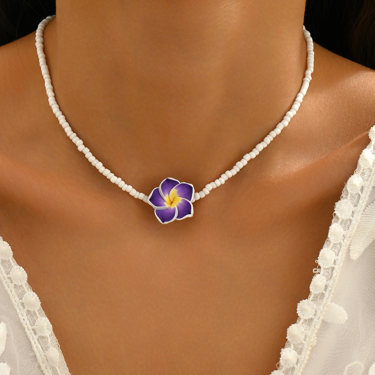 Wholesale Bohemian holiday style cute frangipani soft clay flower rice bead necklace