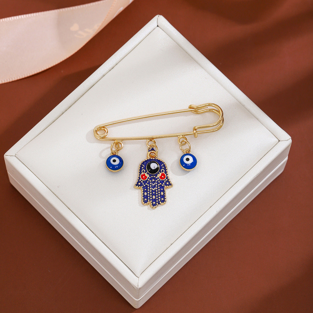 Wholesale Diamond-encrusted Devil' s Eye Tassel Brooch