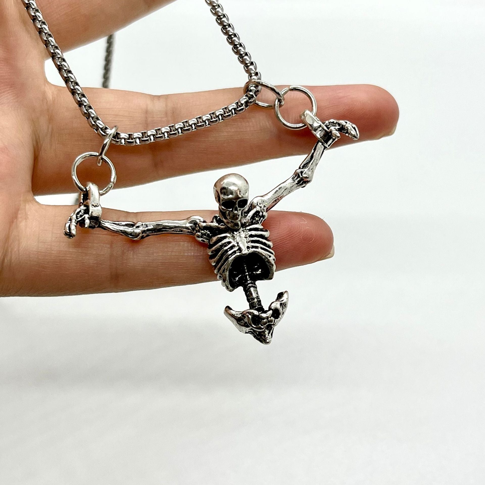 Wholesale exaggerated retro skull bone pendant necklace