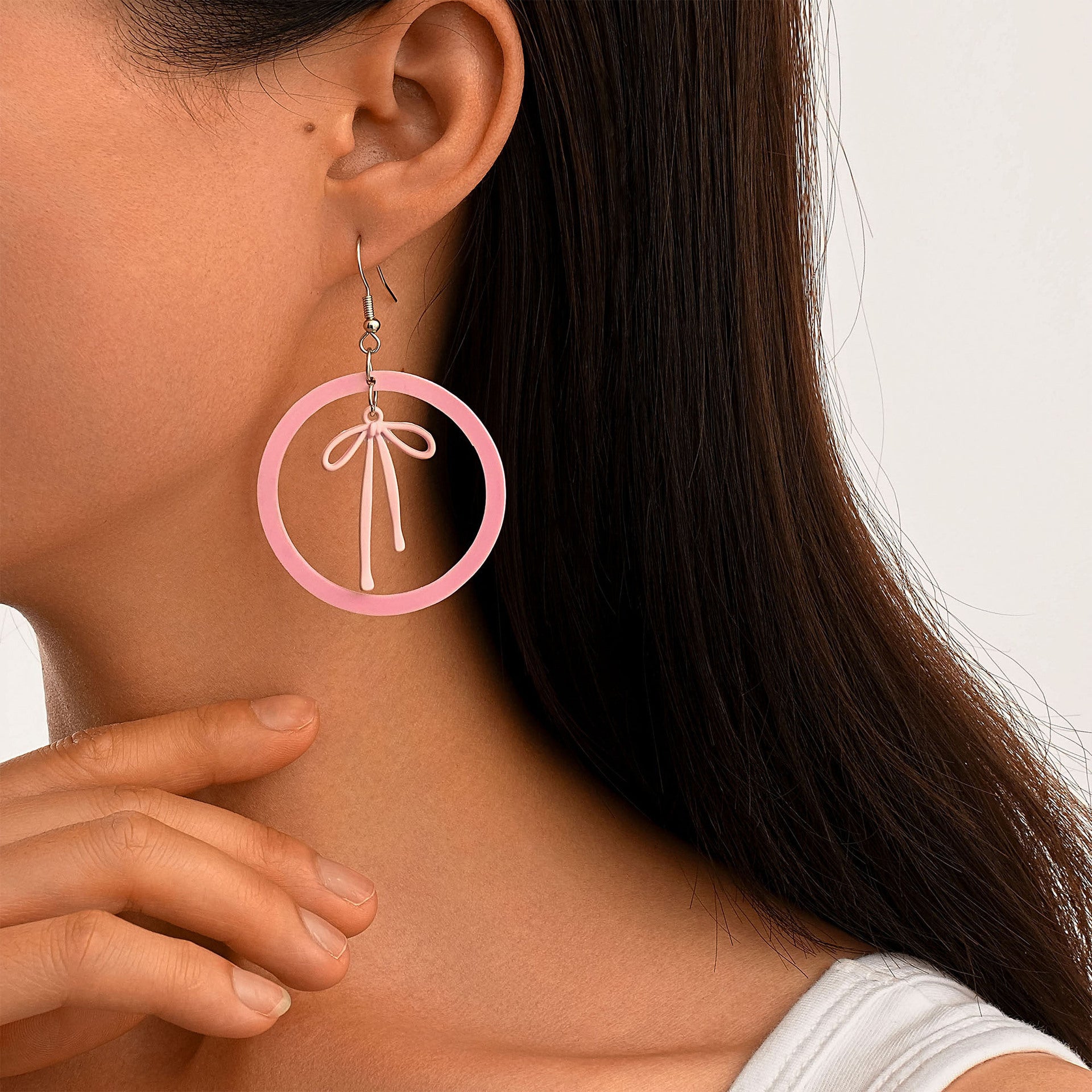 Wholesale acrylic earrings cute pink circle alloy spray-painted bow earrings